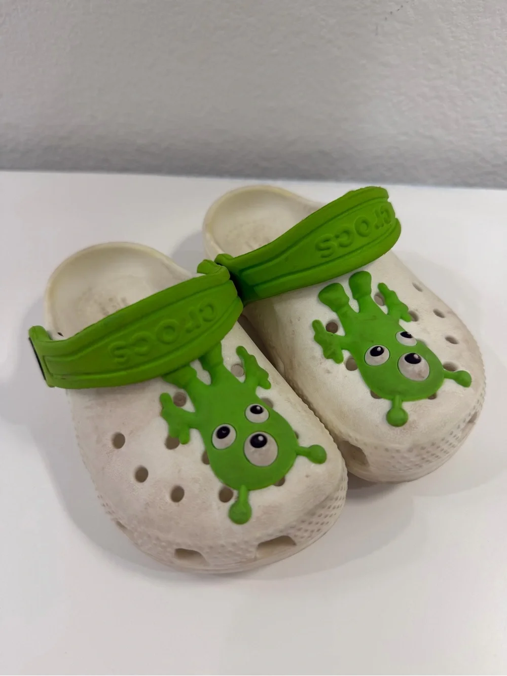 CROCS White Kids Clogs with Bright Green Monster Accents